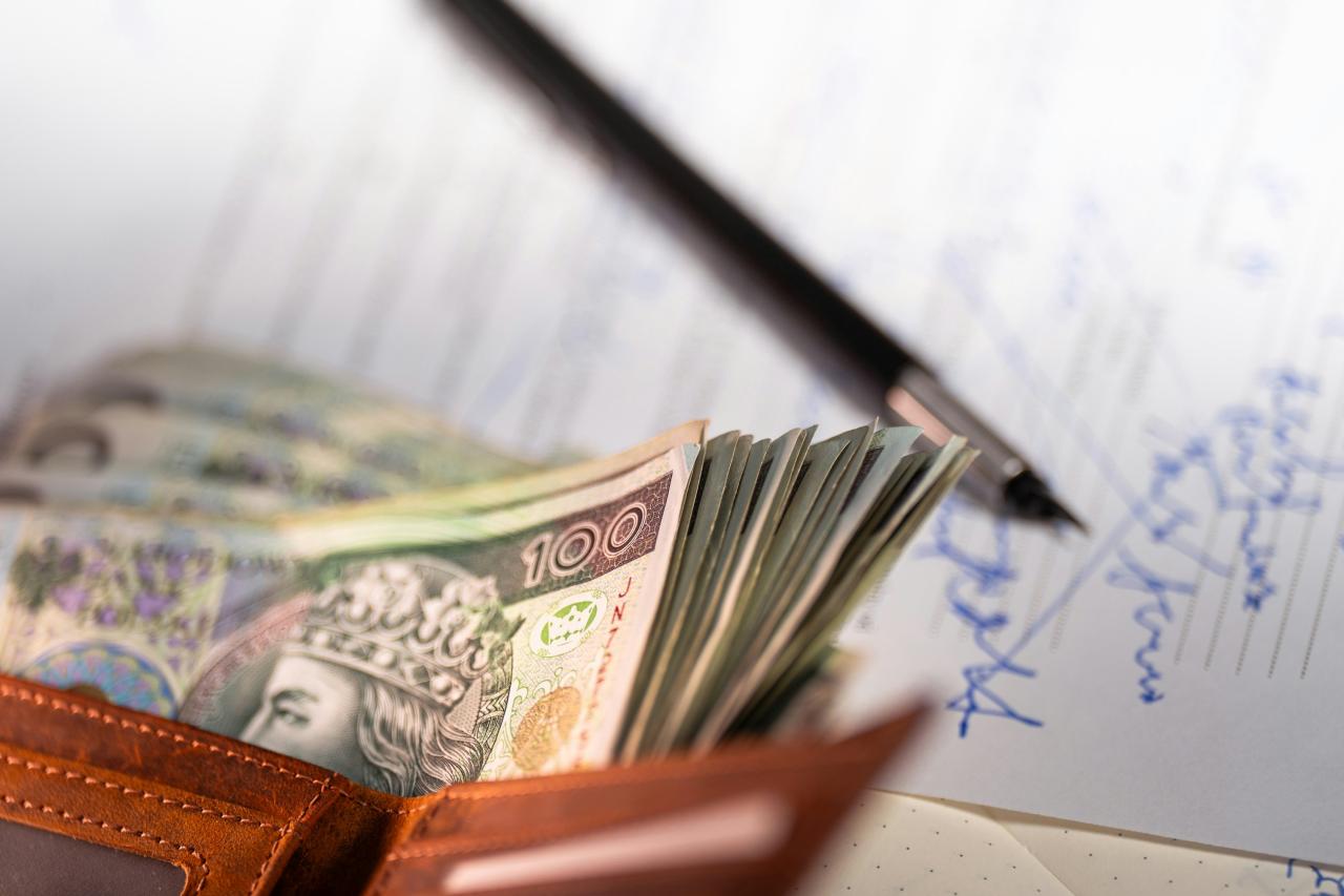 Stack of polish zloty banknotes in a wallet